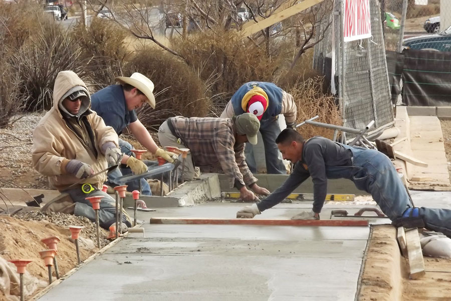 Geomy Pohl crew working on sidewalk