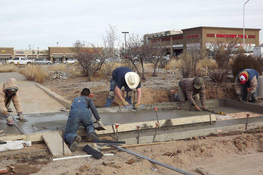 Geomy Pohl crew working on sidewalk